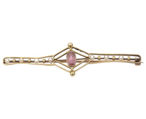 An Edwardian pink tourmaline and pearl bar brooch having central oval tourmaline with pearl bead detail to either side, yello