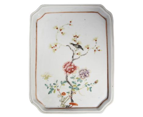 A late 19th century Chinese famille rose trayof rectangular form with re-entrant corners and channelled shallow rim, decorate