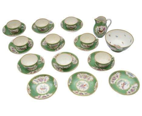 A late Victorian Worcester style part tea servicedecorated with gilt scroll framed panels containing exotic birds, insects  a