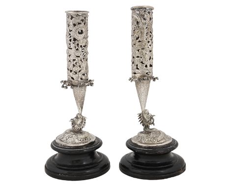 A pair of Chinese export silver vases c.1910unmarked, cylinder pierced form decorated with a dragon, a mythical beast and clo