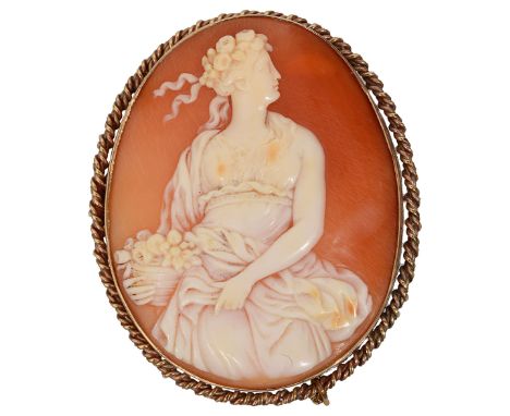 A late 19th century shell cameo broochthe 3/4 length portrait of a maiden, possibly Persephone or Flora, with floral  garland