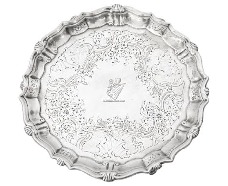 A George II silver small salver/waiter London, 1737 by John Tuiteof shaped circular form, with shell and scroll capped steppe