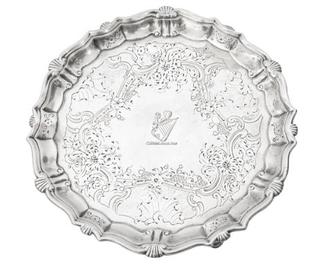 A George II silver small salver/waiter London, 1737 by John Tuiteof shaped circular form, with shell and scroll capped steppe