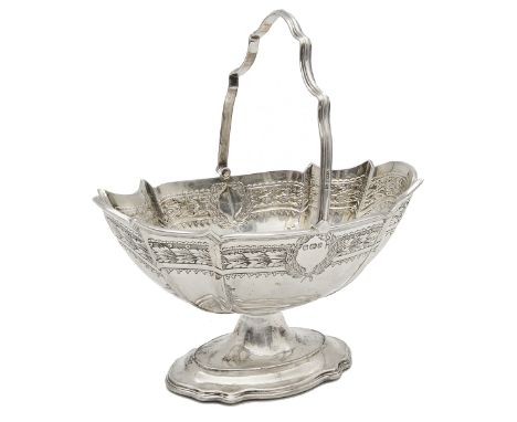 A late Victorian silver swing handled sugar basket,Sheffield, 1896, probably Walker &amp; Hall, of shaped oval form raised on