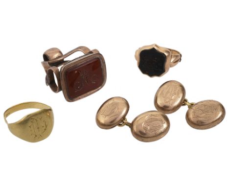 Four items of 19th century gold and gold-mounted jewellerycomprising a pair of 9ct yellow gold oval slightly bombŽ cufflinks,