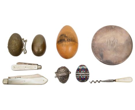 A collection of vertu to include egg shaped thimble cases and sewing etuis, a silver powder compact and two silver and mother