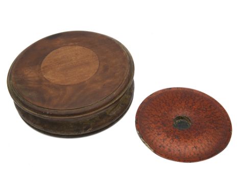 A late 19th century Chinese lacquered wood geomancer's feng shui compass surround in a hardwood caseof typical circular form 