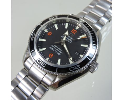 An Omega Planet Ocean Seamaster steel cased chronometer wristwatch, having a signed black dial with date aperture, on a flexi