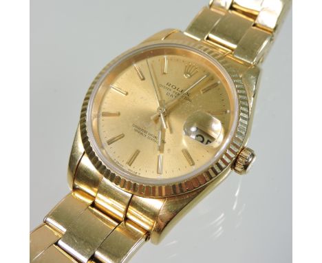 A Rolex Oyster Perpetual Date chronometer 18 carat gold gentleman's wristwatch, the signed dial with baton hours, on a Jubile
