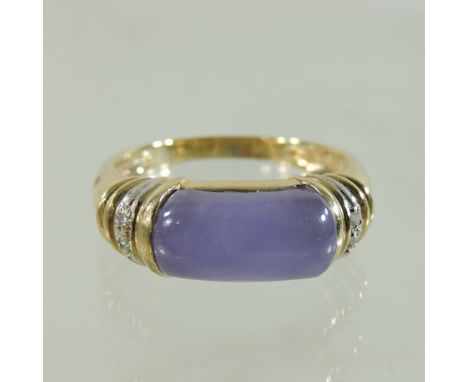 A 14 carat gold lavender jade and diamond set ring, boxed