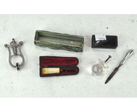 A Victorian papier mache snuff box, together with a cheroot holder in fitted box, a nail file and more