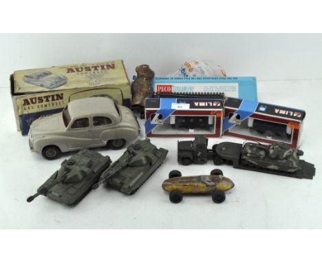 A collection of vintage die cast, comprising two Dinky tanks, a Corgi tank and trailer, two boxed Lima freight stocks, a quan