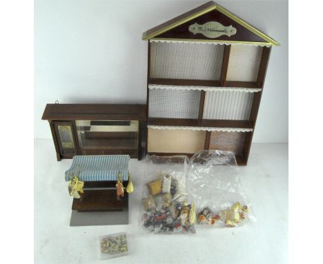 A large collection of dolls' house furniture and accessories, including a handmade wooden Butchers shop front with models of 