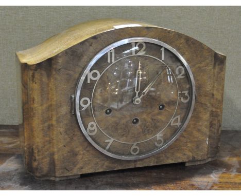 A Continental burr walnut veneered mantel clock, the dial with Arabic numerals denoting hours, movement stamped "Haller Forei