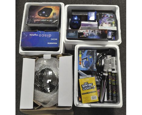 A large collection of disco related wares, to include a FX Lab silver mirror ball, glow sticks, karaoke microphones, laser li