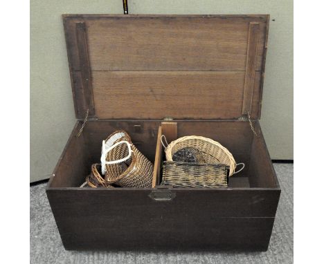 A large wooden storage trunk, with brass handle to either side and concealed handle to lid, 49cm x 104cm x 56cm
