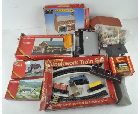 A selection of model railway scenery, including pieces by Tri-ang Hornby, track and more