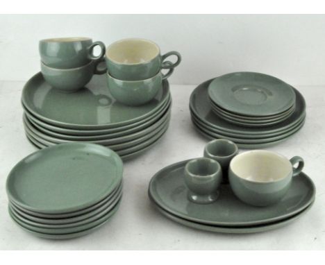 A Denby green part service, including cups, saucers and plates