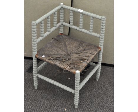 A Victorian, duck egg painted bobbin turned corner chair, 64cm high