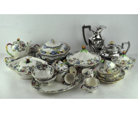 A Royal Cauldon part service, including lidded teapot, tureens, teacups and more, together with a Royal Doulton 'Merryweather