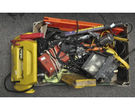 A group of tools, together with a battery charger and a jumpstarter