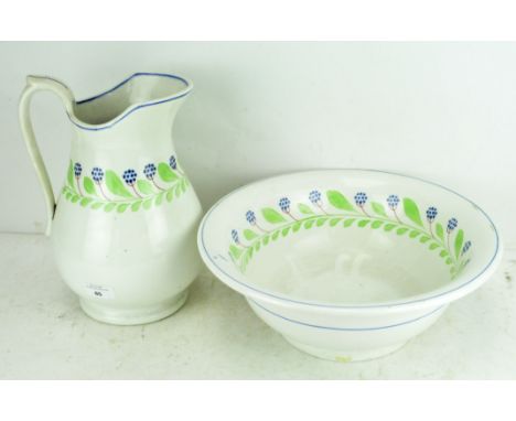 A 20th Century George Jones &amp; Sons pottery wash jug and basin, cream glaze with painted floral and leaf decoration 