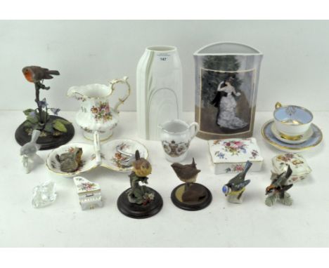 A quantity of decorative china, including various bird figures, a Royal Worcester dish, a Wedgwood small dish, a Hammersley j