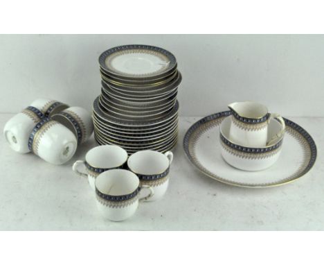 A late 19th/early 20th century Royal Worcester tea set, comprising cups, saucers, side plates and more