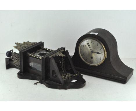 A Victorian mantel clock, metal dial with Arabic numerals within a wooden frame; together with a metal wall clock with gilt e