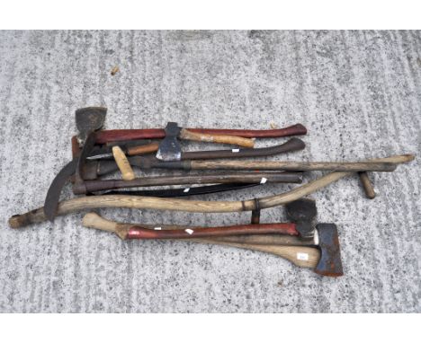 A collection of axes, scythes and other tools (parcel)