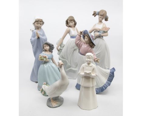 A NAO collection of figures, comprising 'Optimistic Duck', with box, 'Girl Praying', with box, 'Spring Petals', with box, 'Ca