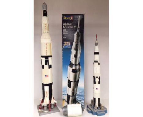 model kit of Apollo Saturn V, in built condition, along with another smaller scale rocket. Some age and display related imper