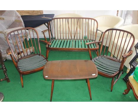 An Ercol three piece suite, comprising settee and two armchairs, together with a small coffee elm table, (4) settee: 76cm Hig