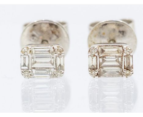 A pair of diamond and 18ct white gold cluster studs set with baguette and brilliant cut diamonds, size approx. 4.5 x 6mm, wit
