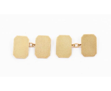 A pair of 9ct gold cufflinks - rectangular form with engine turned decoration, weight approx 9.3gms Condition report: good- m