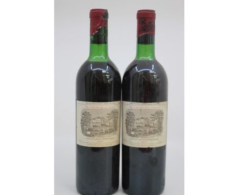 Two Bottles Of Chateau Lafitte Rothschild 1971 , First Growth Premier Grand Cru ClasseA Red And Savoury Classic Wine, That Pa