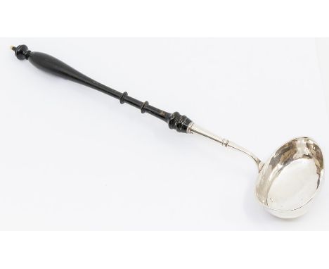 A late 18th Century Scandinavian silver large ladle, boat shaped with turned baluster handle, unmarked, 41cm long 