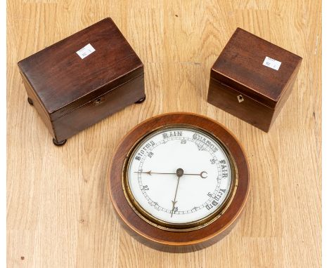 Two George III mahogany tea caddy's along with an early 20th century round wall barometer.