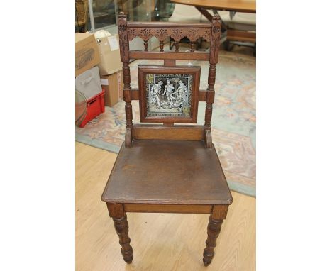 A Scottish Arts and Crafts oak hall chair, the back fitted with a ceramic tile inscribed 'Fair Maid of Perth, Bonthron Accvse