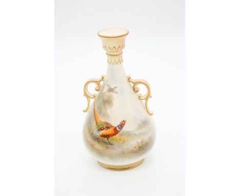 A Royal Worcester blush ivory baluster shape two handled vase, shape no: G995, the body painted with a cock pheasant on the g