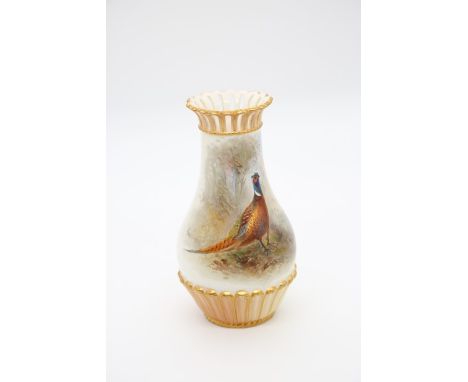 A Royal Worcester blush ivory vase, shape no: G 1061, painted with a cock pheasant in landscape, signed by James Stinton, gre