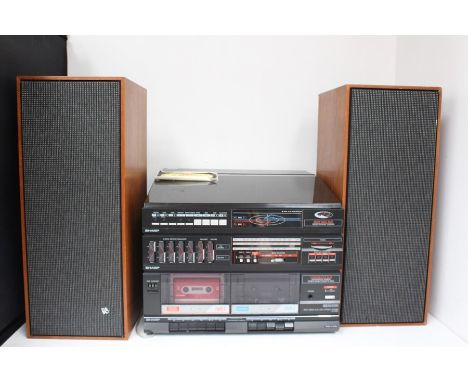 A Sharp HIFI with record player With Dual Side Playing Technology&nbsp; &amp; Bang and Olufsen speakers. A Very Unique Record