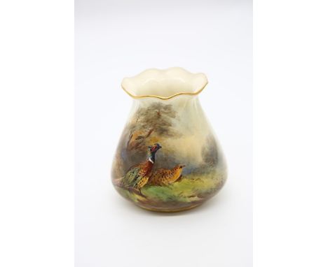 A Royal Worcester shape no: G957, wavy gilt rim, the body painted with a pair of Pheasants in landscape, signed by James Stin