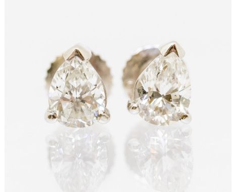 A pair of diamond pear cut studs 18ct white gold, comprising claw set pear cut diamonds, with a total diamond weight approx.1