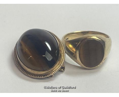 A Tiger's eye signet ring in 9ct gold, hallmarked London 2004, ring size S, weight 7.81g with aTiger's eye brooch in 9ct gold