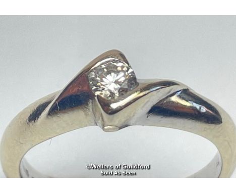 Diamond solitaire ring in square twist setting. Hallmarked 18ct gold. Estimated diamond weight 0.15ct, colour J-K, clarity S1