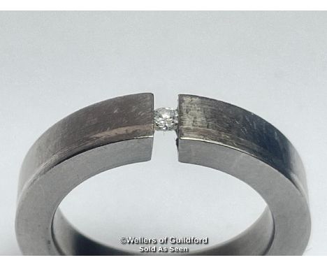 Diamond and Titanium ring by Feniom. Estimated diamond weight 0.04ct, ring size I 1/2 