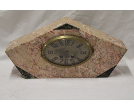 A French Art Deco mantel clock with gilt oval dial in pink marble angular case, 8" x 17"