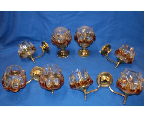A set of 1970s Murano drip glass light fittings including a pair of pendant ceiling lights, a pair of two-branch wall lights 