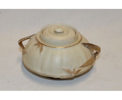 A Royal Worcester china circular bowl and cover with raised gilt reed decoration, 5" long